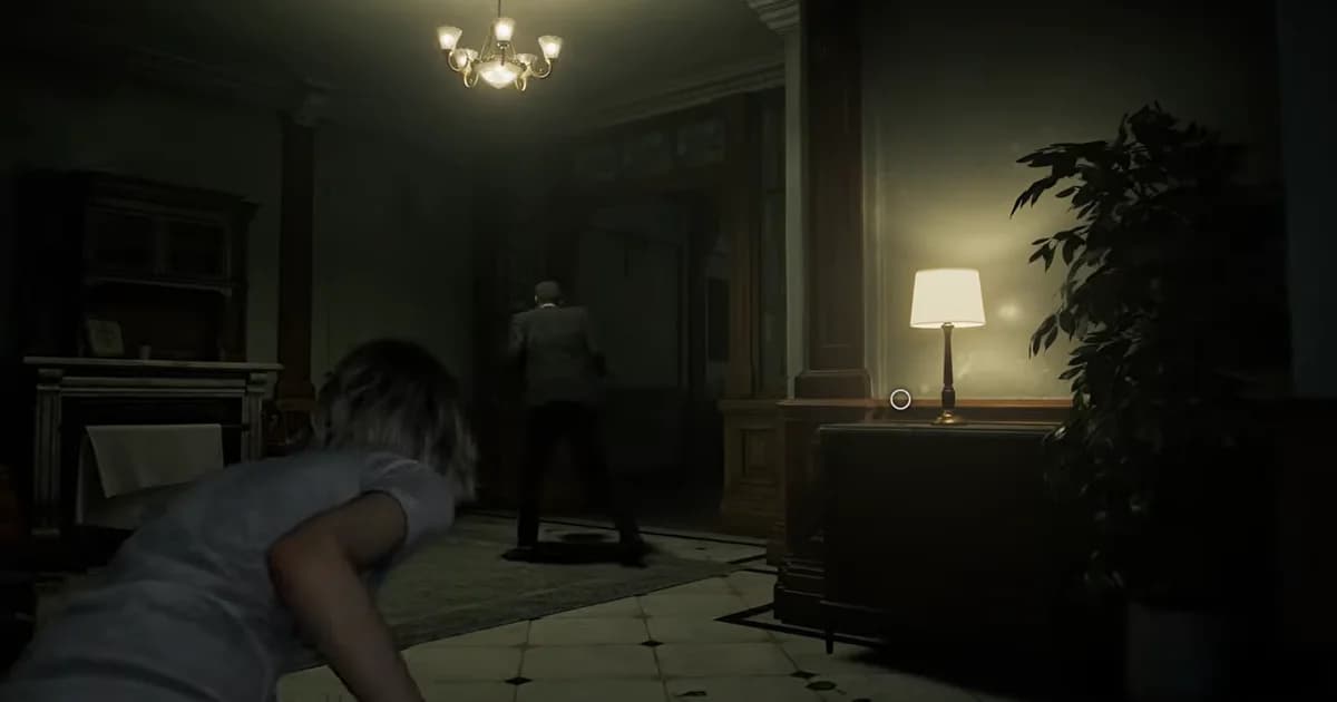 A warmly lit dining room dominated by a chandelier, a figure crouching low in the foreground as a man in a dark suit walks toward a doorway.